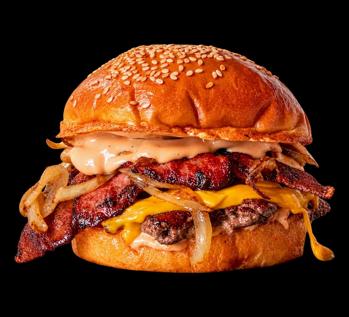 Smash burger de Cheat con queso fundido